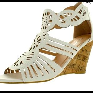 Women’s white zip-up wedge heel size 8.5.